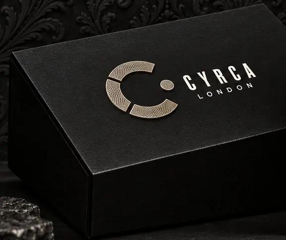 The matte black CYRCA box with an engraved champagne symbol